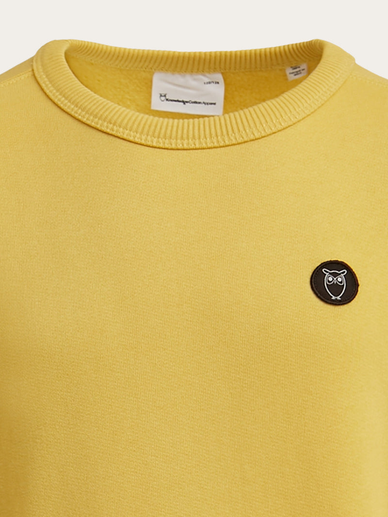 KnowledgeCotton Apparel - YOUNG Badge crew neck sweat Sweats 1429 Misted Yellow