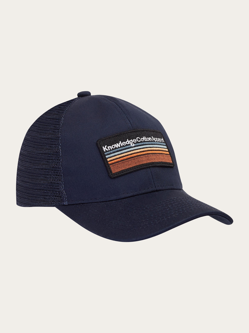 KnowledgeCotton Apparel - UNI Badge twill trucker cap Caps 1001 Total Eclipse